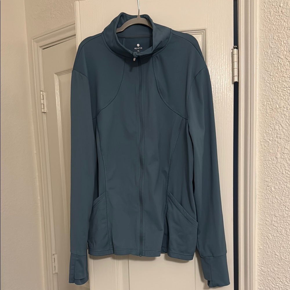 Blue Utility Jacket with High Collar and Full-Length Zipper